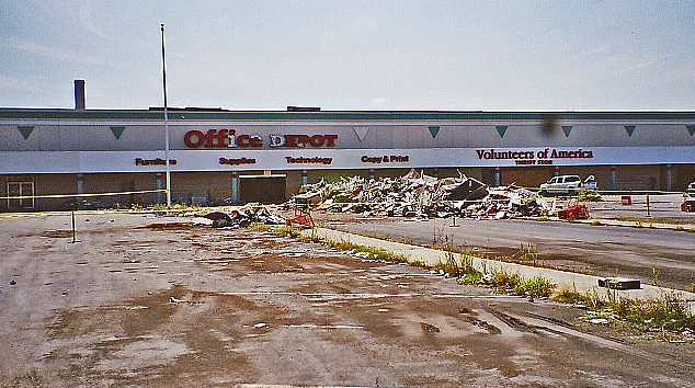 Parking lot badly in need of parking lot sweeping, cleaning